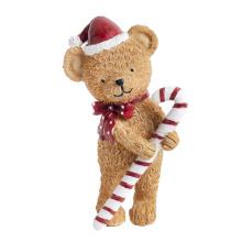 POLYRESINOVÝ MEDVEĎ V SANTOVSKEJ ČIAPKE S CUKROVOU TRSTINOU, HNEDÝ