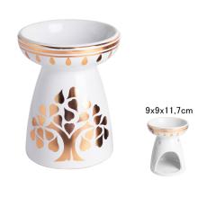 KERAMICKÉ DREVO V BRONZOVEJ FARBE NATRETÉ OLEJOM NA BIELOM PODKLADE