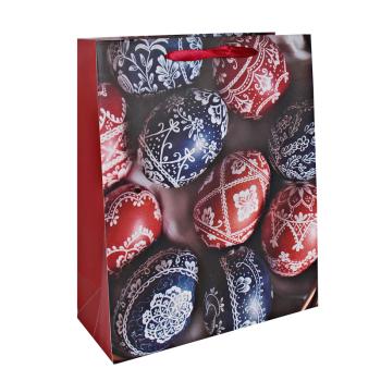 PAPIEROVÉ VRECÚŠKA S MATNÝMI, STUŽKOVÝMI CHLOPŇAMI, MODRÉ A ČERVENÉ VEĽKONOČNÉ VAJÍČKA