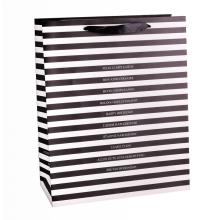 PAPIEROVÁ TAŠKA MATNÁ ČIERNOBIELA PRUHOVANÁ S MNOHÝMI JAZYKMI "BOLGOG SZÜLETÉSNAPOT"