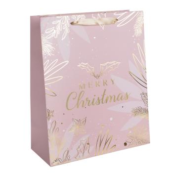 PAPIEROVÁ TAŠKA MATNÁ, ZLATÁ S LESKLOU POTLAČOU, NÁPIS "MERRY CHRISTMAS", RUŽOVÝ PODKLAD