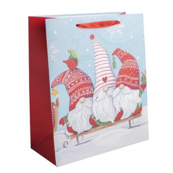 PAPIEROVÁ TAŠKA, MATNÁ, 3 PRSTOVÉ FÚZY NA SÁNKACH, V ČERVENO-BIELEJ ČIAPKE