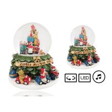 POLYRESINOVÁ SNEHOVÁ GUĽA, OTÁČACIA, S LED DIÓDOU A HUDBOU "JINGLE ALL THE WAY", S POSTAVIČKAMI