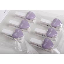 DEKORATÍVNA SADA DREVENÝCH PINZIET V SÁČKU S POLYRESINOVÝM SRDCOM, 6 KUSOV, S NÁPISOM "TRUE LOVE", FIALOVÁ